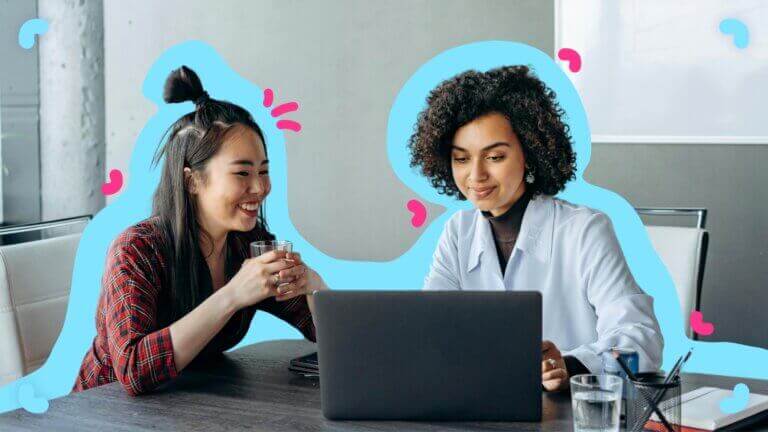 Two women measuring SOP documentation on their laptop