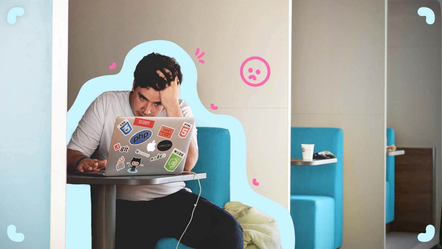 A man, one of the subject matter experts, sitting at a desk with a laptop.